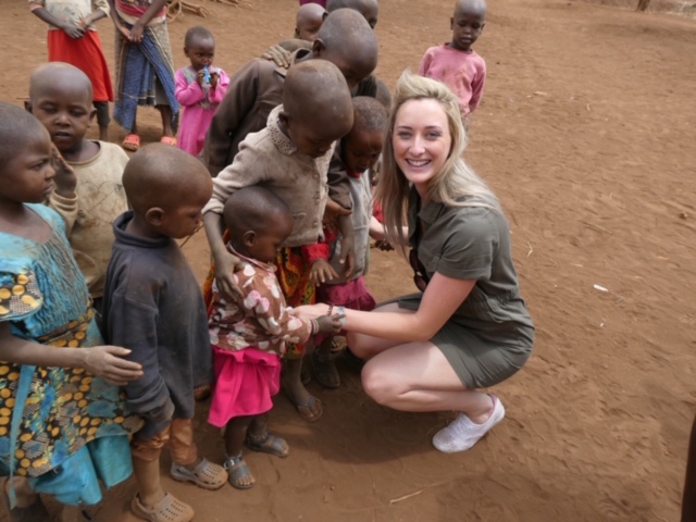 Young Kenyan children with a safari goer