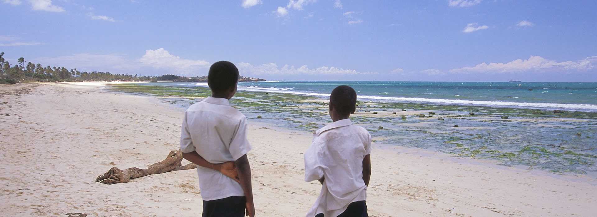 Two boys on the beach in Dar Es Salaam