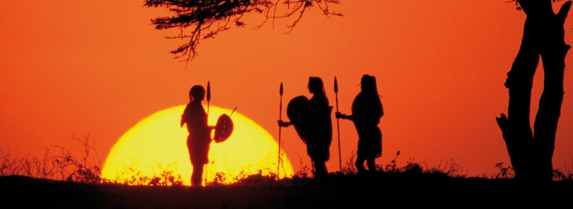 Warriors at sunset in the Serengeti