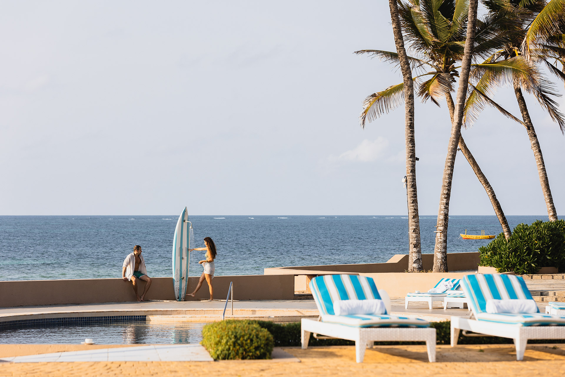Main_pool_loungers_and_ocean_view.jpg