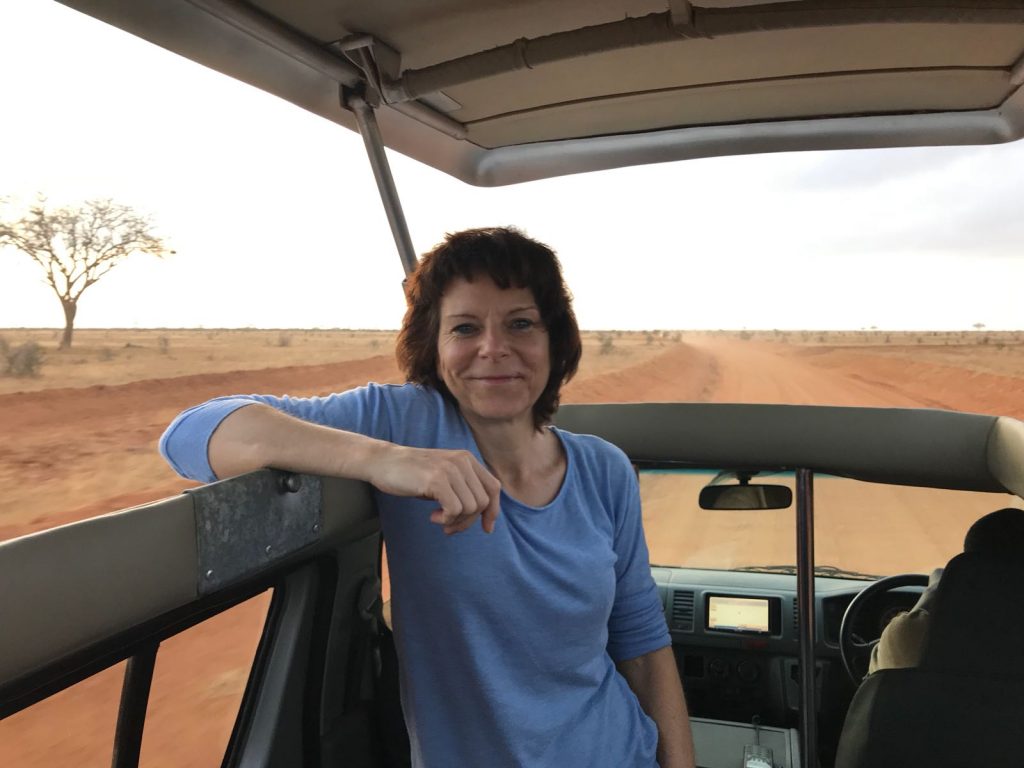 Woman in Somak safari vehicle