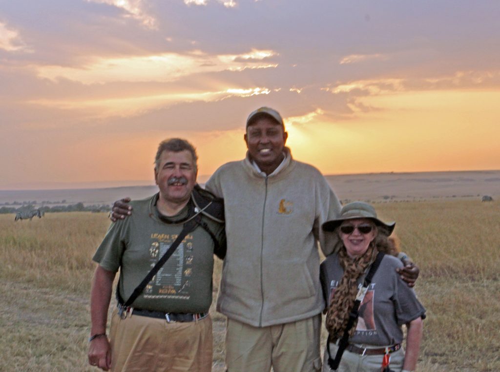 With Vincent: Sandra & Steve with Vincent, their Masai guide in the Mara.