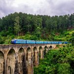 The iconic blue train going over Sri Lanka's Nine Arch Bridge near Demodora between Ella and the end of the line at Badulla.