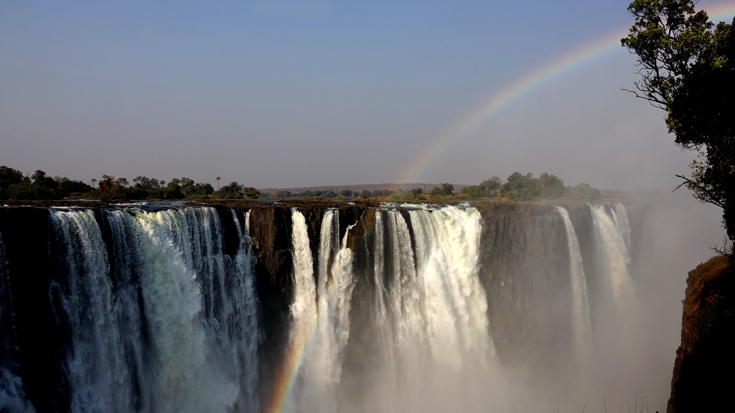 The Rainbow created by the Spray from Victoria Falls, in Zimbabwe