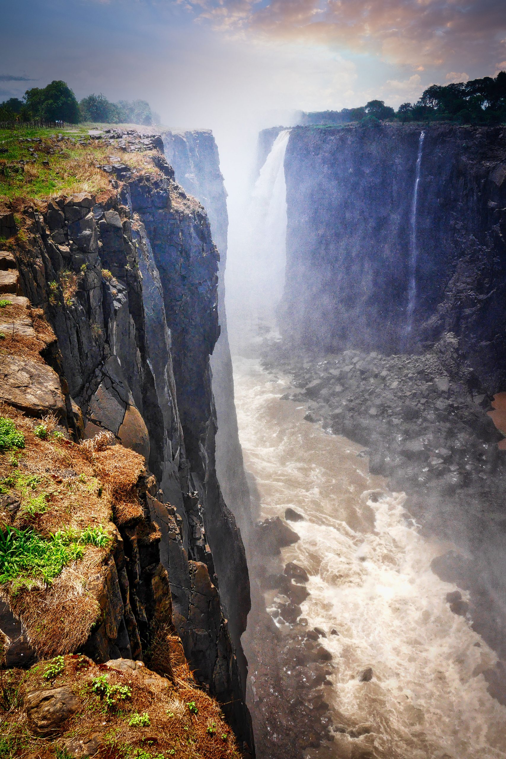 The Magestic Victoria Falls, millions of litres of water from the Zambezi River plunging into the gorge below.