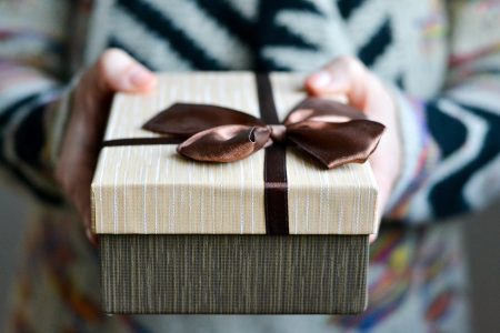 gift box being presented to someone